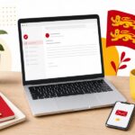 Un ordinateur portable sur un bureau en bois affiche une messagerie professionnelle, avec un smartphone et une tasse, illustration editoriale aux accents rouge et jaune